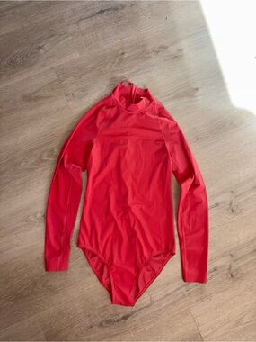 lululemon athletica Long-Sleeve One-Piece Swimsuit in orange/Red